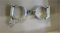 antique steel handcuffs with key