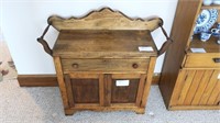 Pine commode with towel bars,