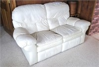 Leather reclining love seat,