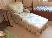 Upholstered chaise with quilt
