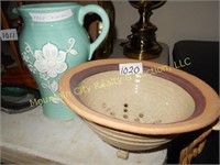 Clay colander and porcelain vase