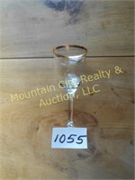 Eight gold rimmed glass wine goblets
