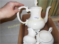Ceramic coffee pot with creamer and pitcher