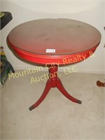 Painted over, round mahogany table
