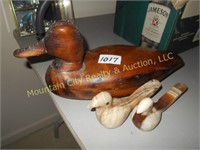 Wooden duck decoy and two marble doves