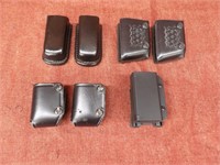 Lot of 7 mag pouches. 6 leather, one plastic
