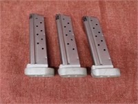 x3 1911 mags with large aluminum bumpers. 38 Super