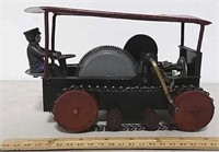 Tin wind up tractor with cast iron driver