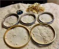Bracelets (5), brooch, ring