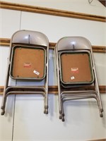 Four Folding Chairs.