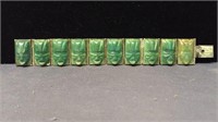 Jade face bracelet marked Mexican Silver