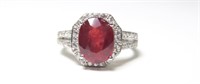 Sterling silver oval cut ruby ring with cubic