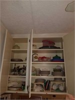 Kitchen cabinet of misc items,