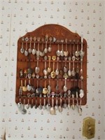 Wooden rack with collector spoons