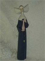 Lladro Prayerful Nun with Flowers Figurine