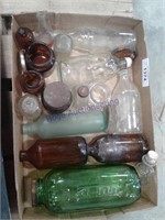 Glass bottles, clear, green, brown
