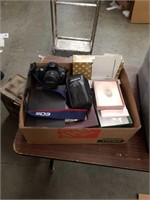 Box of cameras and stationery