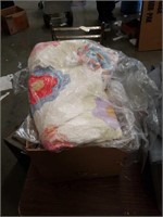 Box of patch quilts and  Towels