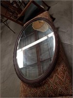 Oval wall mirror