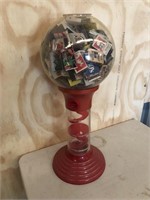 Gumball machine filled with match booklets