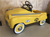 Yellow taxi pedal car