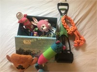 26B designer box full of pet toys and supplies