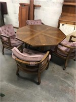 Dining table with rolling chairs