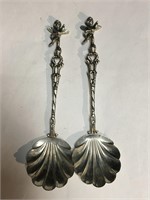 2 Figural Cherub Salt Spoons