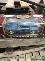 Tucker 1:18 scale car in box