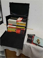 Group of vintage Reel tapes in carrying case