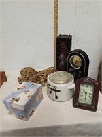 Decorative mantel clocks, wine box, butterfly