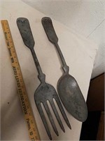 Large decorative metal spoon and fork wall decor