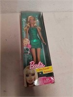New Barbie May Emerald birthstone doll
