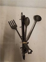 Group of melting spoons and others