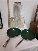 3 large glass containers with metal lids and two