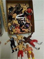 Group of collectible wrestler action figure toys
