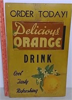Cardboard orange drink advertisement