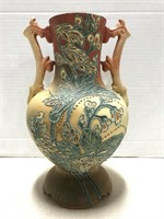 Ceramic handled urn w/ relief design