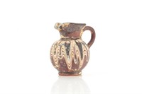 Ancient terracotta pottery miniature jug