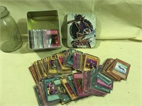 Large set of Yu-Gi-Oh cards in tin