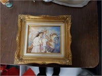 Beautiful gold framed picture of boy & girl on