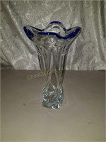 Beautiful twisted glass vase with blue rim