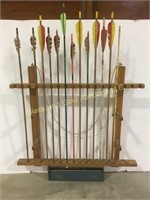 Wooden arrow rack with arrows