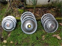 3 SETS OF HUBCAPS, CADDY, PMD AND OTHER