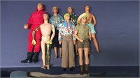 7 assorted vintage Ken dolls