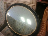 Circular mirror in Black frame
