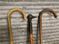 Three vintage canes