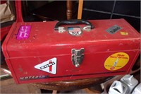 Red metal toolbox and contents