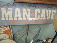 WOODEN MAN CAVE SIGN