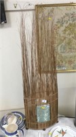Unusual table lamp with tall willow detail.